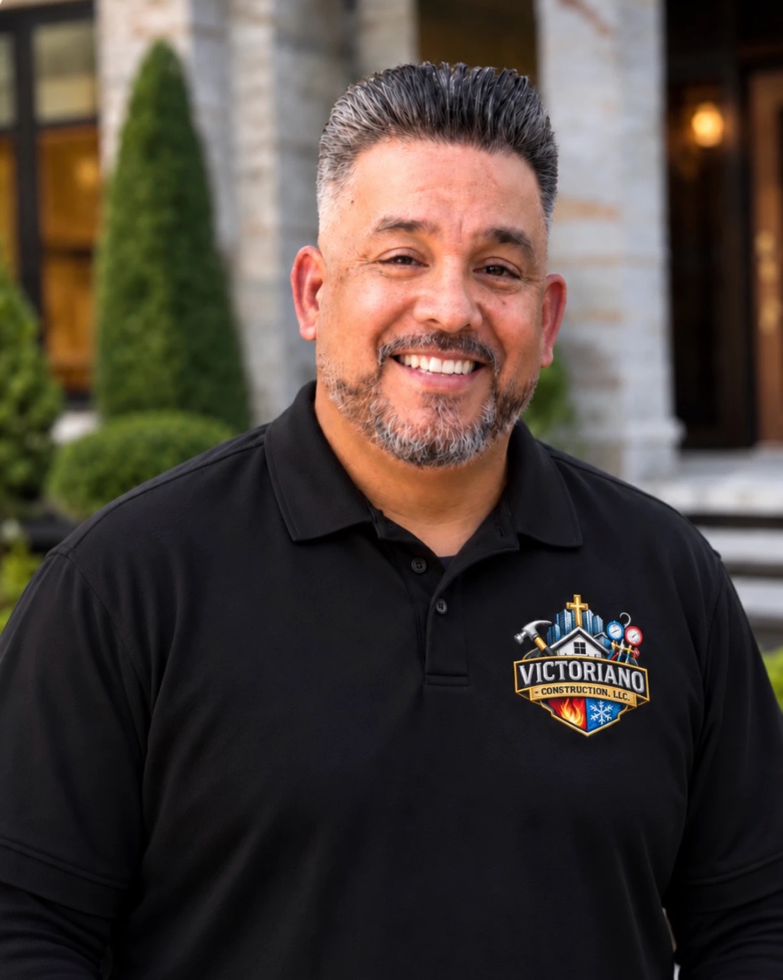 Danny from Victoriano Construction smiling in a professional outdoor portrait